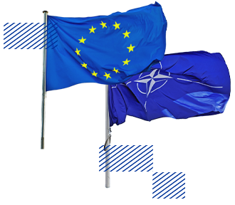 Vlajky EU a NATO.